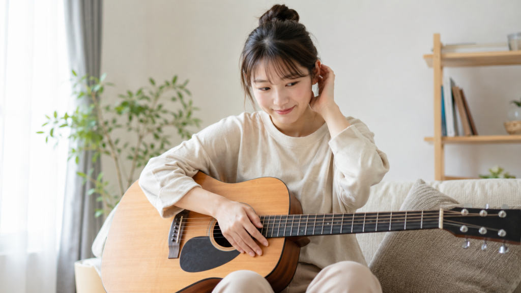 ギターを趣味にしたいけれど少し恥ずかしそうにする大人の初心者